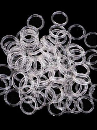 Skaidrus žiedelis romanetės audiniui 9x13 mm. Skaidrus žiedelis romanetės audiniui 9x13 mm.